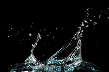 Water splash isolated on black background