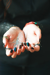 a hands in glitter