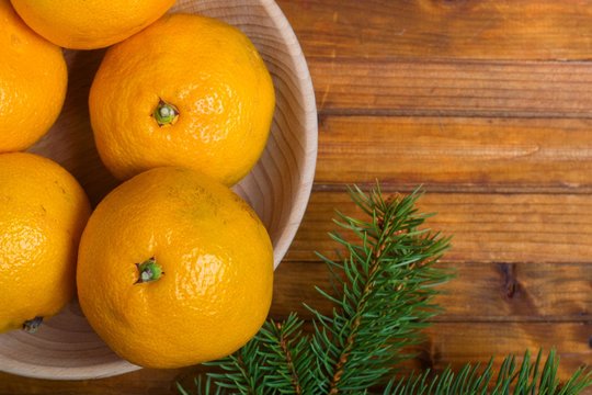 delicious juicy tangerine on a Christmas background.Top view, copyspace.