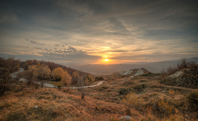 Amazing sunset in colorful autumnal landscape