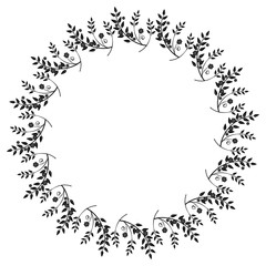 Black and white round frame with floral silhouettes. 