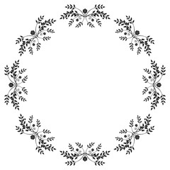 Black and white round frame with floral silhouettes. 