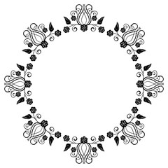 Black and white round frame with floral silhouettes. 