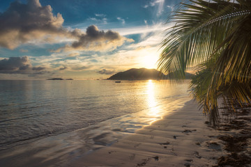 Beautiful sunrise over the tropical beach, Praslin, Seychelles