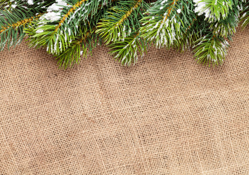 Christmas Snow Fir Tree Over Burlap Texture