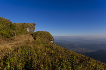 Fototapeta na wymiar The mountain phu chee fah and blue sky at national park in chiangrai,thailand