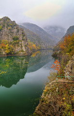 Obraz premium Beautiful landscape with river in the mountain and colorful autumn forest