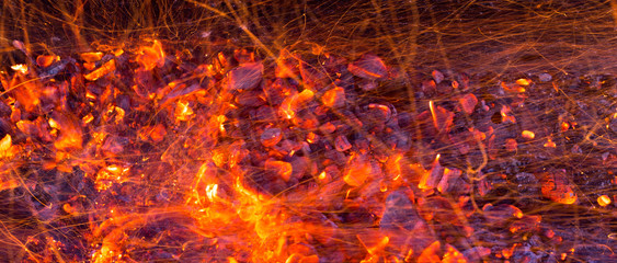 burning charcoal as background