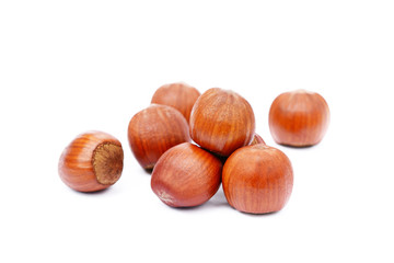 Group healty hazelnuts isolated on white background