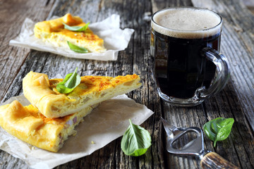Zucchini and lards pie and mug of ale