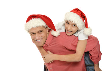 father with son  wearing Christmas  caps