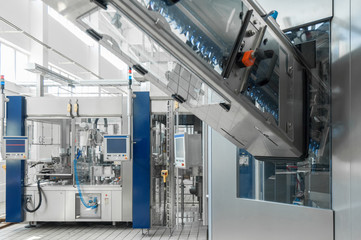 for the production of plastic bottles and bottles on a conveyor belt factory