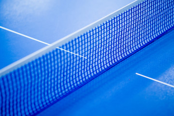 Net on blue ping pong table