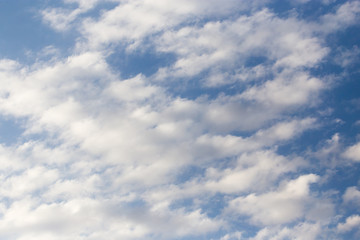 clouds in the blue sky as background