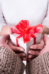 Woman holding a christmas gift