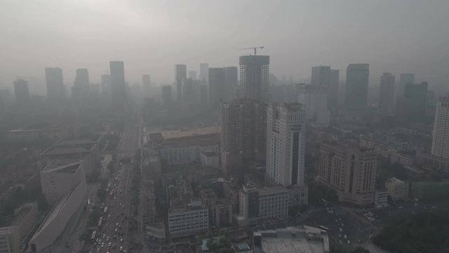 Aerial drone flight towards the city center of Chengdu in Sichuan, China