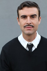 Portrait of a trendy man with a mustache