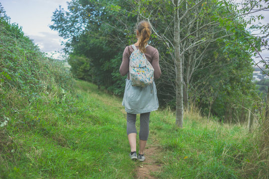 Woman walking in countryside