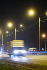 Fototapeta na wymiar Truck on a highway in the night