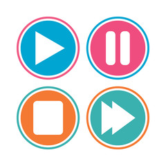 Player navigation icons. Play, stop and pause signs. Next song symbol. Colored circle buttons. Vector