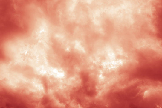 Red clouds: Texture of many reddish clouds on a day cloudy and rainy weather.