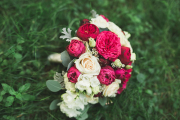 Wonderful luxury wedding bouquet of different flowers