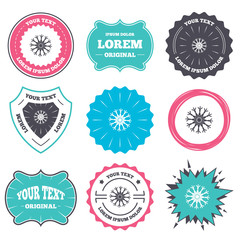 Label and badge templates. Snowflake artistic sign icon. Christmas and New year winter symbol. Air conditioning symbol. Retro style banners, emblems. Vector