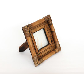 wooden photo frame white on a background