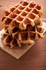 Belgian waffles on a wooden table