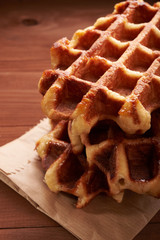 Belgian waffles on a wooden table