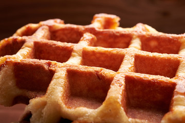 Belgian waffles on a wooden table