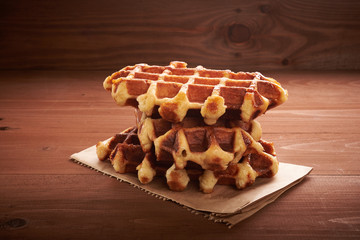 Belgian waffles on a wooden table