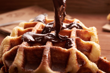 Belgian waffles on a wooden table