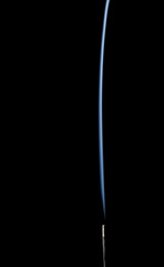 Incense stick with smoke on black background