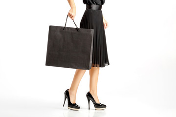 people, sale, black friday concept - woman with shopping bags