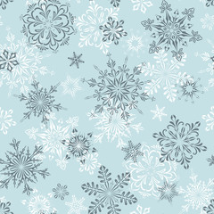 Winter seamless pattern with snowflakes.
