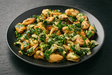 Mussels cooked with parsley, garlic and wine.