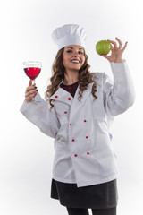 Girl chef with a large glass of wine on a white background