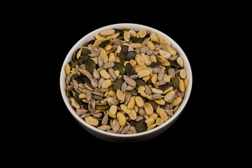 mixed seeds in wooden bowl