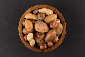 Mixed nuts in shells in a bowl