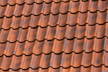 Red tiles roof background