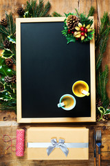 Christmas background with a chalkboard. space for writing text