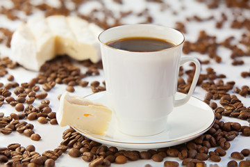 coffee in coffee cup with natural grains