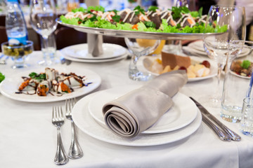 Cutlery set for one person on a festive serving table