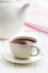 A cup of black tea.