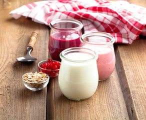 natural yoghurt on a wooden background