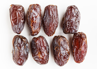 Medjool dates on white background