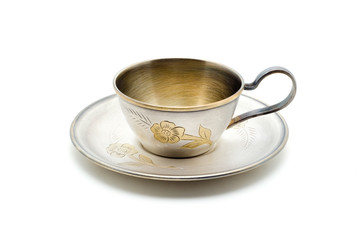Vintage metall coffee cup isolated on white.