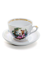 Empty elegant coffee cup on a saucer isolated on white background.