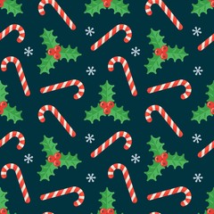 Seamless flat Christmas pattern of candy cane and holly